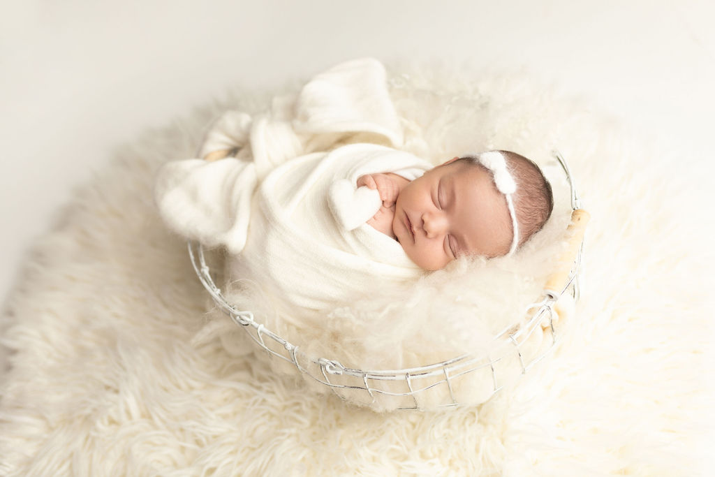 Expert Posing Techniques for Safely Capturing Newborns in the Studio